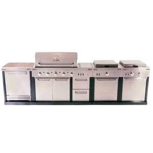 Stainless steel Char-Broil outdoor kitchen with grill, side burners, storage cabinets, and prep area.