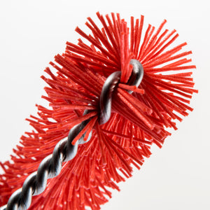 Red cleaning brush with metal chain and hook.