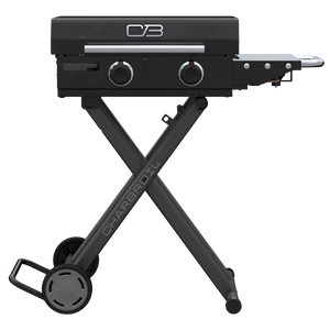 Black Char-Broil portable gas grill with foldable side shelf and wheels.