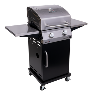 Char-Broil two-burner gas grill with stainless steel lid, side shelves, and cabinet storage on locking caster wheels.
