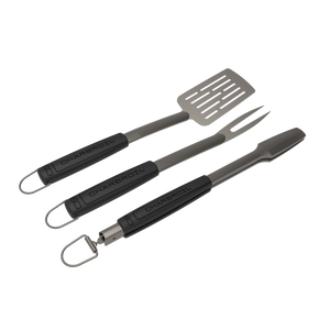 "Black Char-Broil BBQ tool set with spatula, fork, and bottle opener."