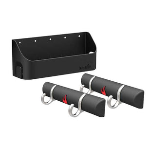 Black wall-mounted storage rack with two padded hooks and a tray.