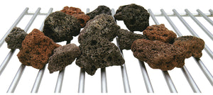 Assorted brown and black lava rocks on a metal grate.