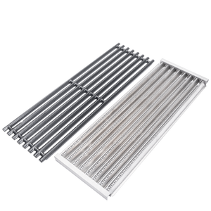 Silver metal grill grates with raised ridges and holes.